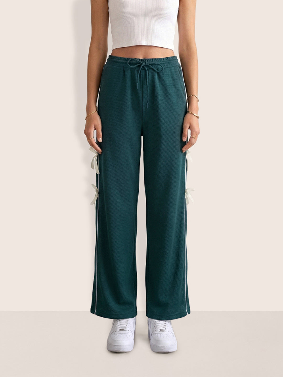 Women's Green Flare Solid Casual Trousers