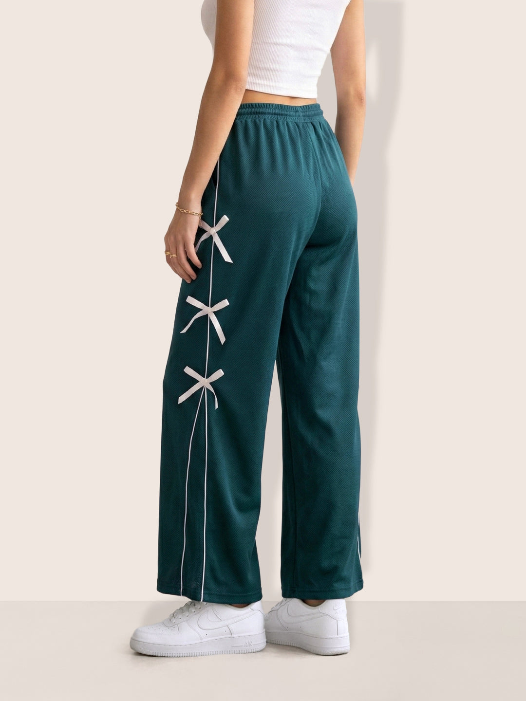 Women's Green Flare Solid Casual Trousers
