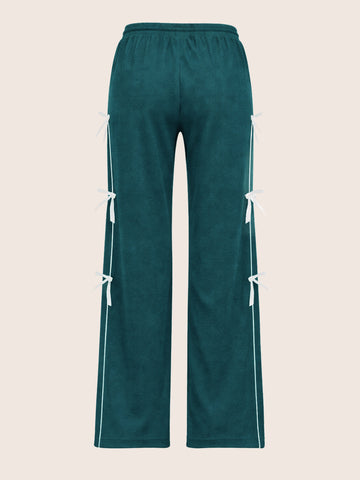 Women's Green Flare Solid Casual Trousers